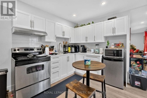 Kitchen upper level totally remodelled w/quartz - 169 Florence Street, Ottawa, ON 
