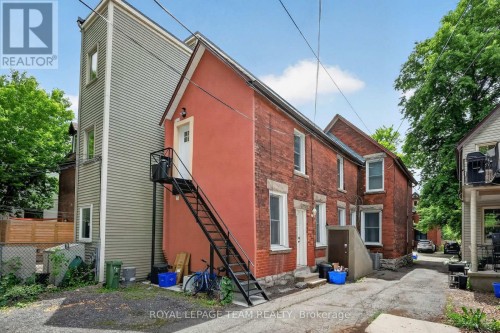 Rear of building steel stairs to 2nd flr repainted - 169 Florence Street, Ottawa, ON 