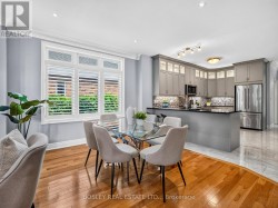 Dining room connects kitchen to living room - 