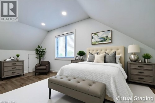 Sloped ceiling bedroom featuring recessed lighting and wood-finish flooring - 78 Hillyard Street, Hamilton, ON 