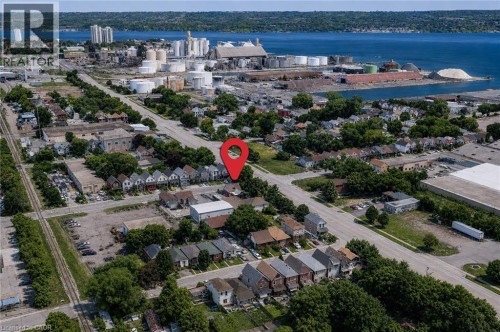 Aerial overview of a residential area featuring multiple single-family homes and structures - 78 Hillyard Street, Hamilton, ON 