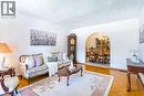 Cozy sitting area framed by oversized windows - 102 Markson Crescent, Hamilton, ON 