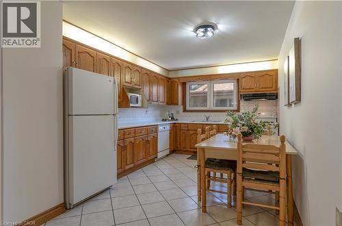 A functional eat-in kitchen - 102 Markson Crescent, Hamilton, ON 