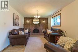 Family room with beautiful wood fireplace - 
