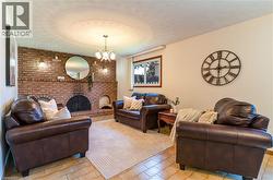 Family room with beautiful wood fireplace - 