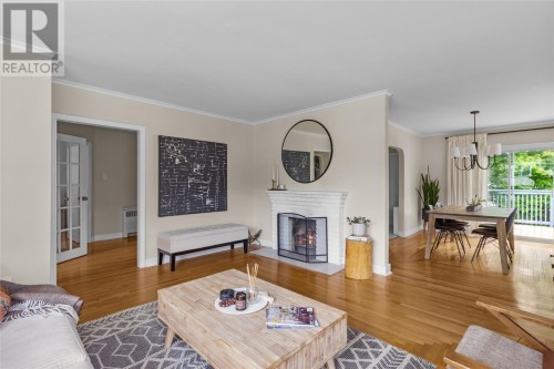 Living room with wood burning fireplace - 42 Cornwall Heights, St. John'S, NL 