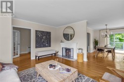 Living room with wood burning fireplace - 