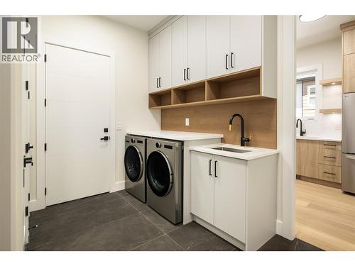 Main level laundry and mud room - 979 Loseth Drive, Kelowna, BC 