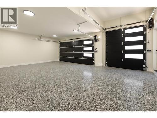 Triple garage with over sized 3rd Bay door - 979 Loseth Drive, Kelowna, BC 