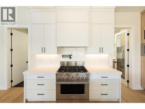 6 Burner Gas Range with Pot-Filler and Quartz backsplash - 979 Loseth Drive, Kelowna, BC 