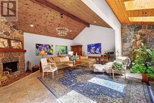 Cathedral Ceilings and beautiful Fireplace - 731 Concession 15 W, Tiny, ON - Indoor Photo Showing Living Room With Fireplace