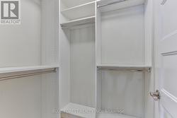 Bedroom 2 walk in closet with custom upgrade - 