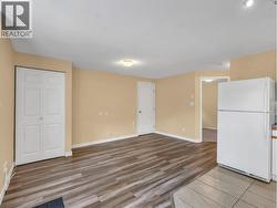 LIVING AREA ON LOWER LEVEL AS IS - 