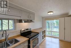 Kitchen Area with River Views - 