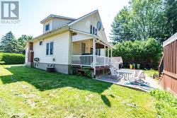 Back yard covered deck and patio area - 