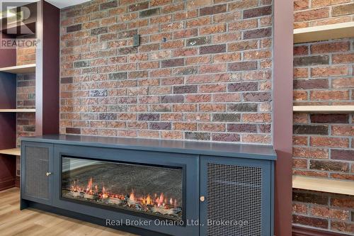 Electric Fireplace Console / Electric Outlet Above - 930 Marshall Road, Tiny, ON 