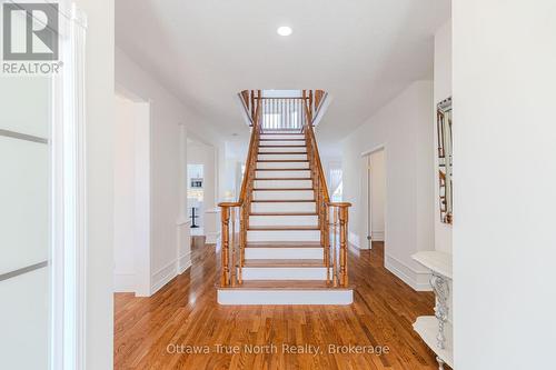 Elegant staircase as focal point welcome! - 19 Black Tern Crescent, Ottawa, ON 