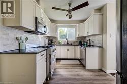 Kitchen w/ Stainless Steel Appliances - 