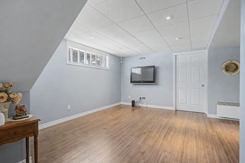 Family Room - 1825 Rue De Bedford, Saint-Bruno-De-Montarville, QC - Indoor Photo Showing Other Room