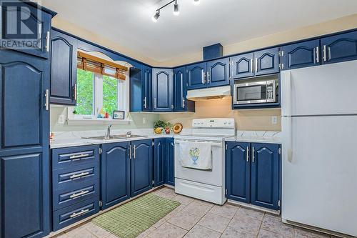 Main Level Apartment Kitchen - 16 Grandy Crescent, Mount Pearl, NL 