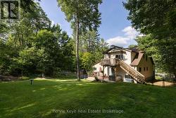 Two walkout decks. Two private places to unwind. - 