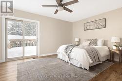 Second floor - bedroom w/ walkout to private deck - 