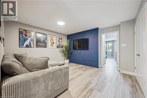 Spacious interior with light wood-finish flooring - 907 Robert Ferrie Drive, Kitchener, ON 
