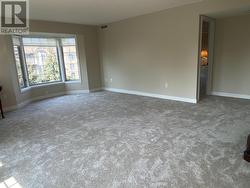 living space and entry to primary bedroom - 