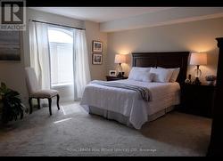 Primary bedroom with furniture - 