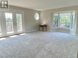More bay windows and large living area - 