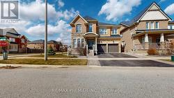 48 HERON HOLLOW AVENUE Richmond Hill, ON L4E 0G9