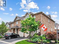 End unit with privacy and gardens - 