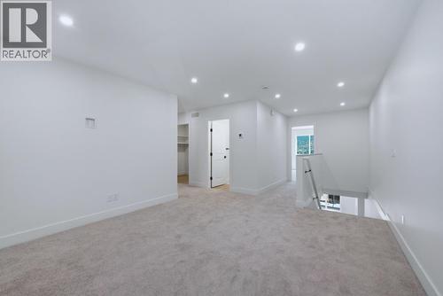 377 Arrowleaf Rise, Coldstream, BC - Indoor Photo Showing Other Room