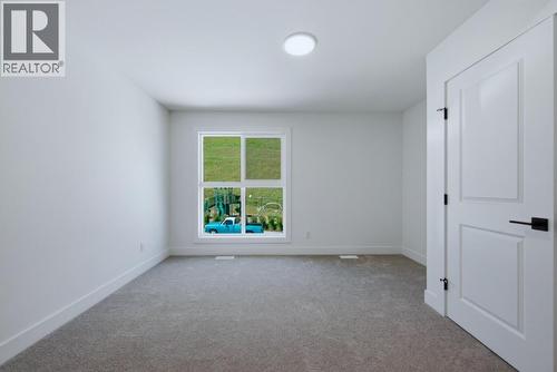 377 Arrowleaf Rise, Coldstream, BC - Indoor Photo Showing Other Room