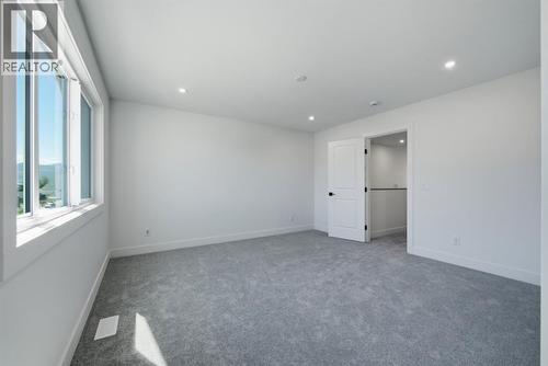 377 Arrowleaf Rise, Coldstream, BC - Indoor Photo Showing Other Room
