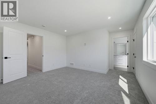 377 Arrowleaf Rise, Coldstream, BC - Indoor Photo Showing Other Room