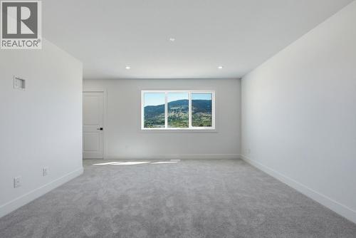 377 Arrowleaf Rise, Coldstream, BC - Indoor Photo Showing Other Room