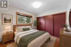 DIGITALLY STAGED PRIMARY BEDROOM - 