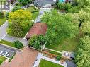 Aerial view showcasing a residential property with skylights, mature trees and no rear neighbours - 13 Swanhurst Boulevard, Mississauga, ON 