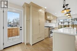 Direct Access to the Side Yard from Custom Kitchen - 
