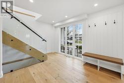 Open-Riser Staircase Features Glass Panels - 