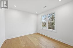 Third Bedroom Offers Engineered Hardwood Flooring - 