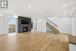 Dramatic Feature Wall w/Gas Fireplace in Living Rm - 
