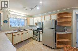 Updated kitchen counter, taps and cupboard handles - 