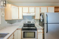 Updated kitchen counter, taps and cupboard handles - 
