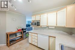 Updated kitchen counter, taps and cupboard handles - 