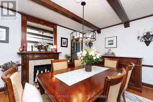Decorative fireplace for added ambience. - 52 Yates Street, St. Catharines (Downtown), ON 