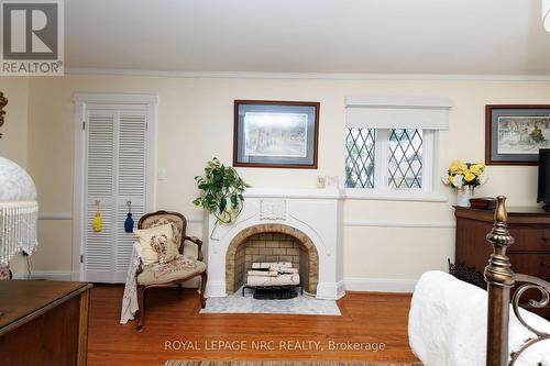 Decorative fireplace for cozy atmosphere. - 52 Yates Street, St. Catharines (Downtown), ON 