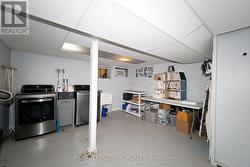 The large laundry room in the basement. - 