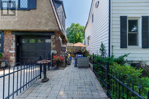 Interlock patio, single driveway & attached garage - 52 Yates Street, St. Catharines (Downtown), ON 